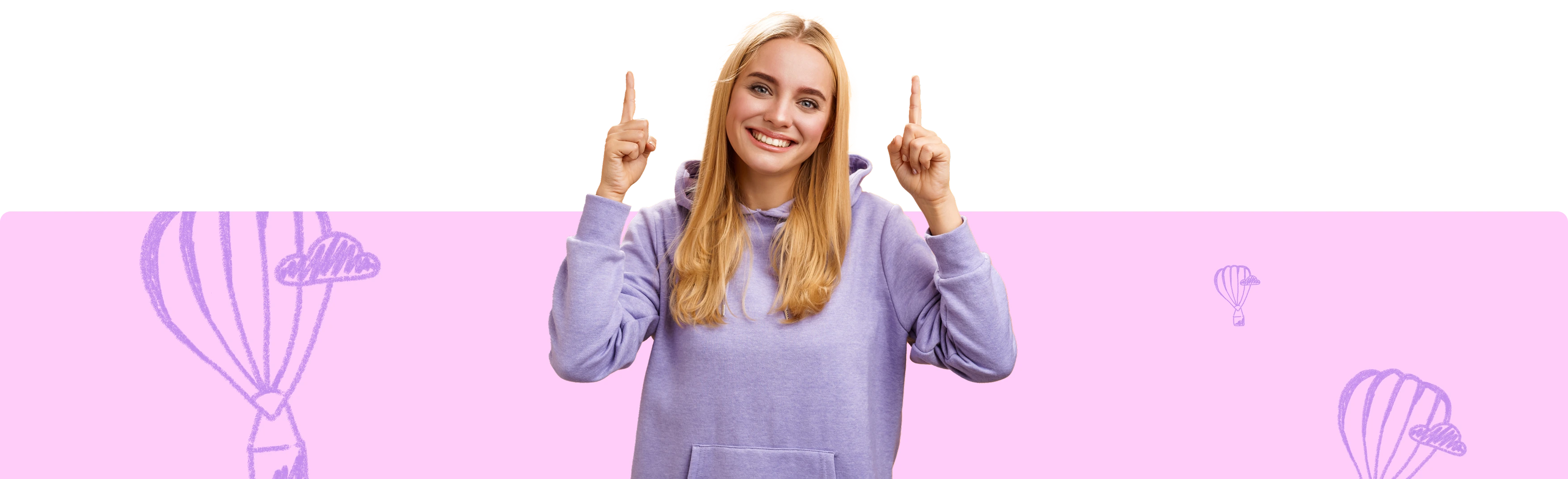 Uśmiechnięta kobieta wskazująca na coś na górze