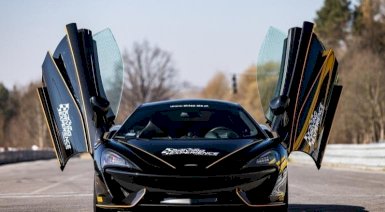 Jazda za kierownicą McLaren 570GT - Toruń MotoPark (5 okrążeń)